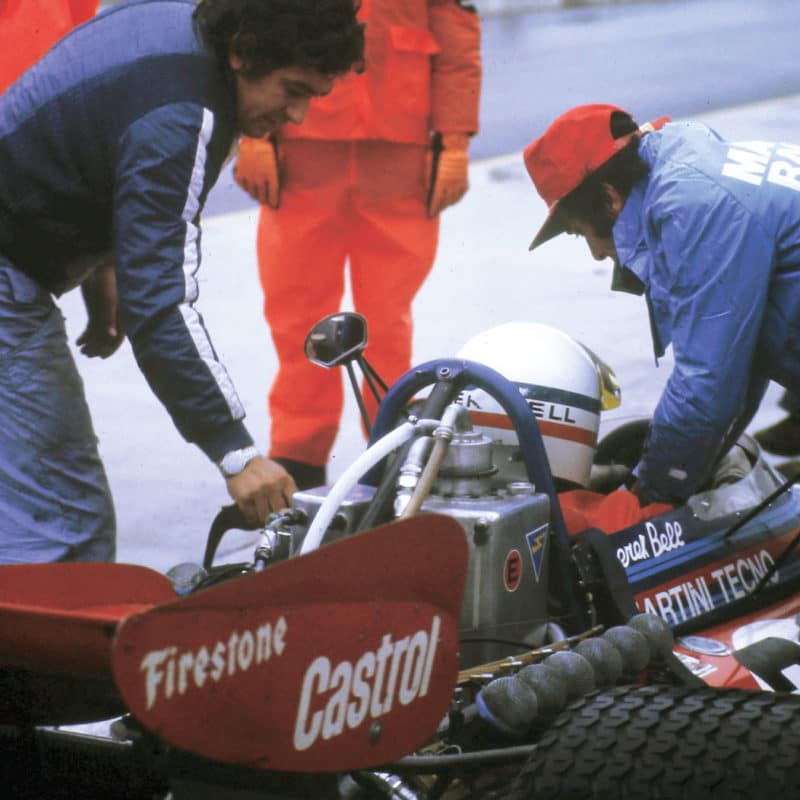 Derek Bell stops in the pits