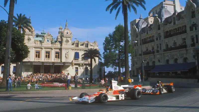 John Watson chases Emerson Fittipaldi at the 1974 Monaco Grand Prix