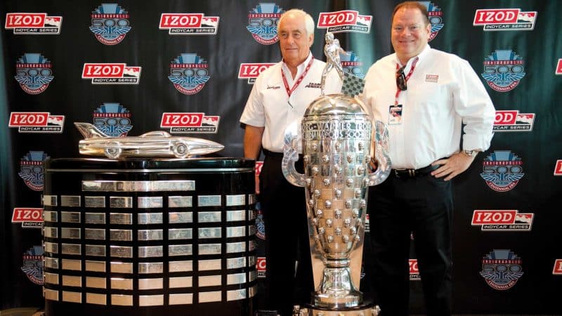 Roger Penske and Chip Ganassi in 2010 with the Harley J Earl Trophy